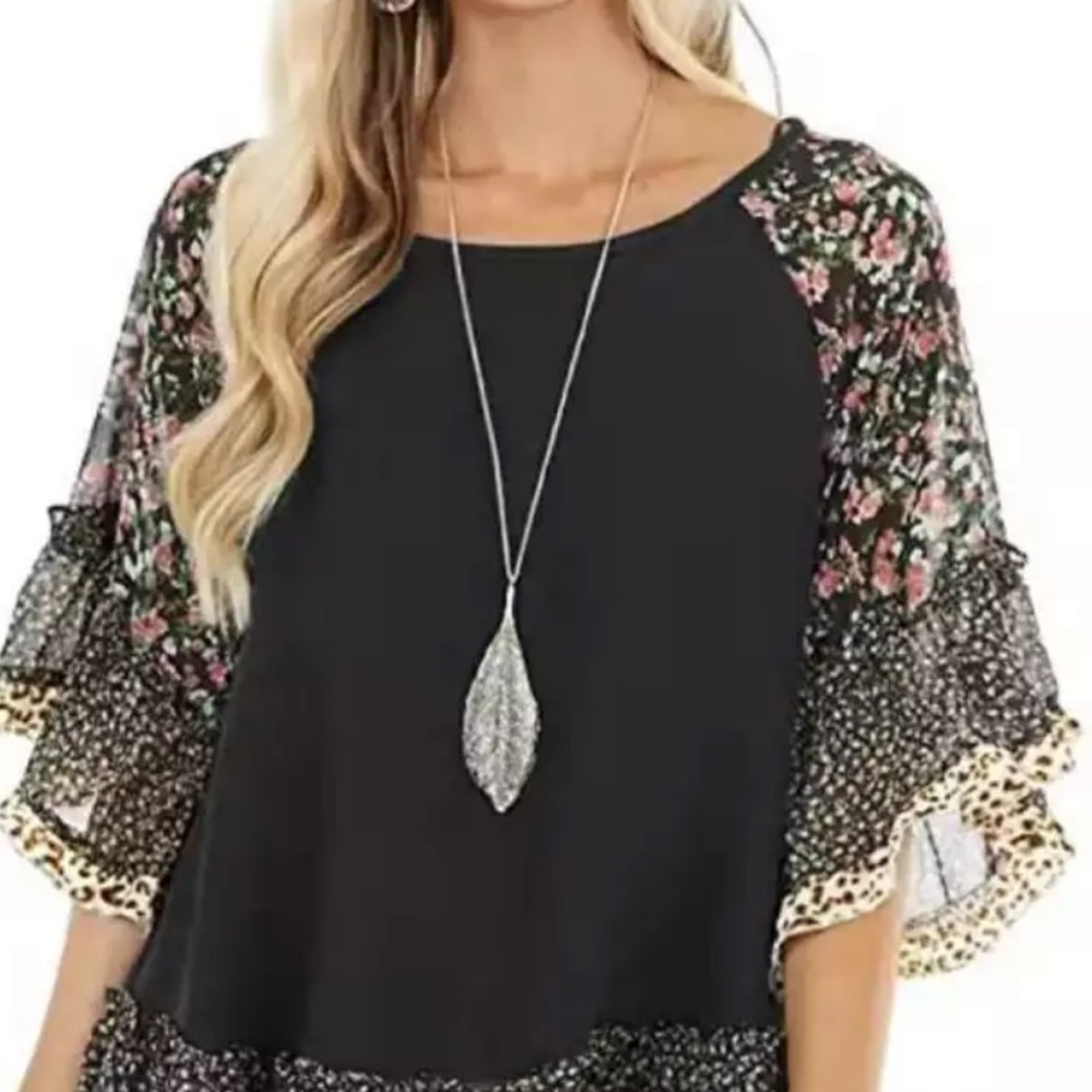 Boutique trendy mixed media top, black with flora sleeves and trim